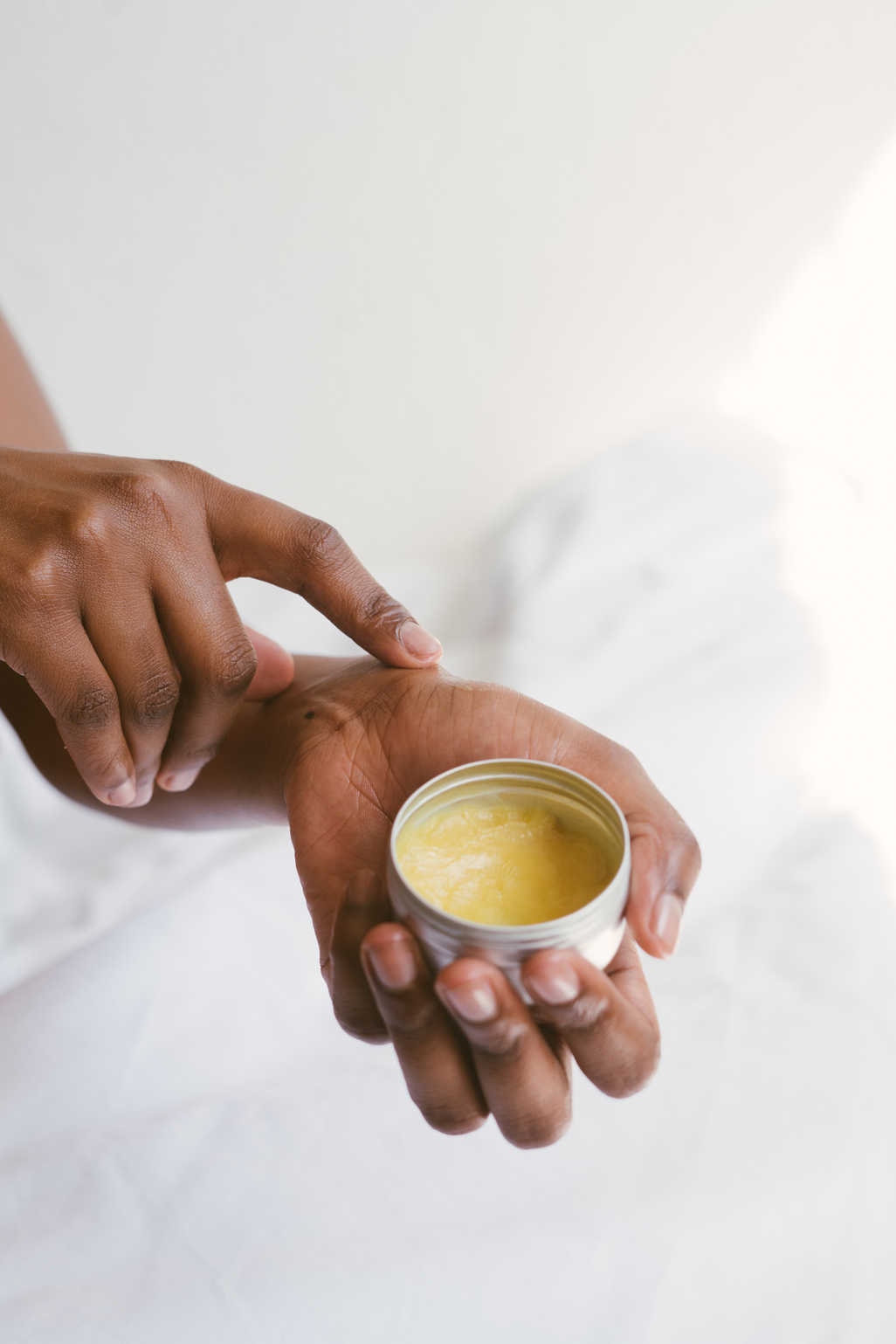 Person Holding A Hand Cream